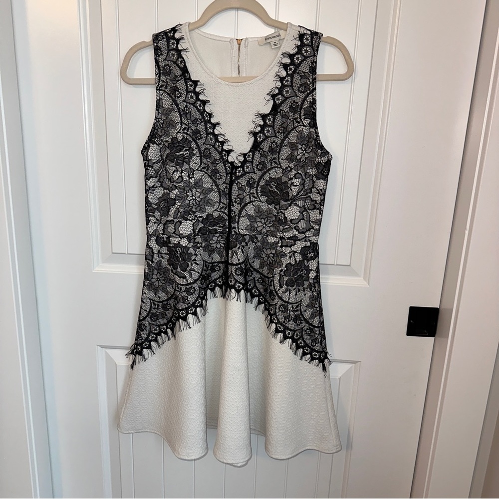 Flattering White Dress with Black Lace